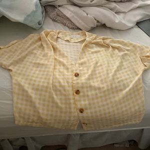 Yellow and white checkered shirt, button down could be used for swim coverup
